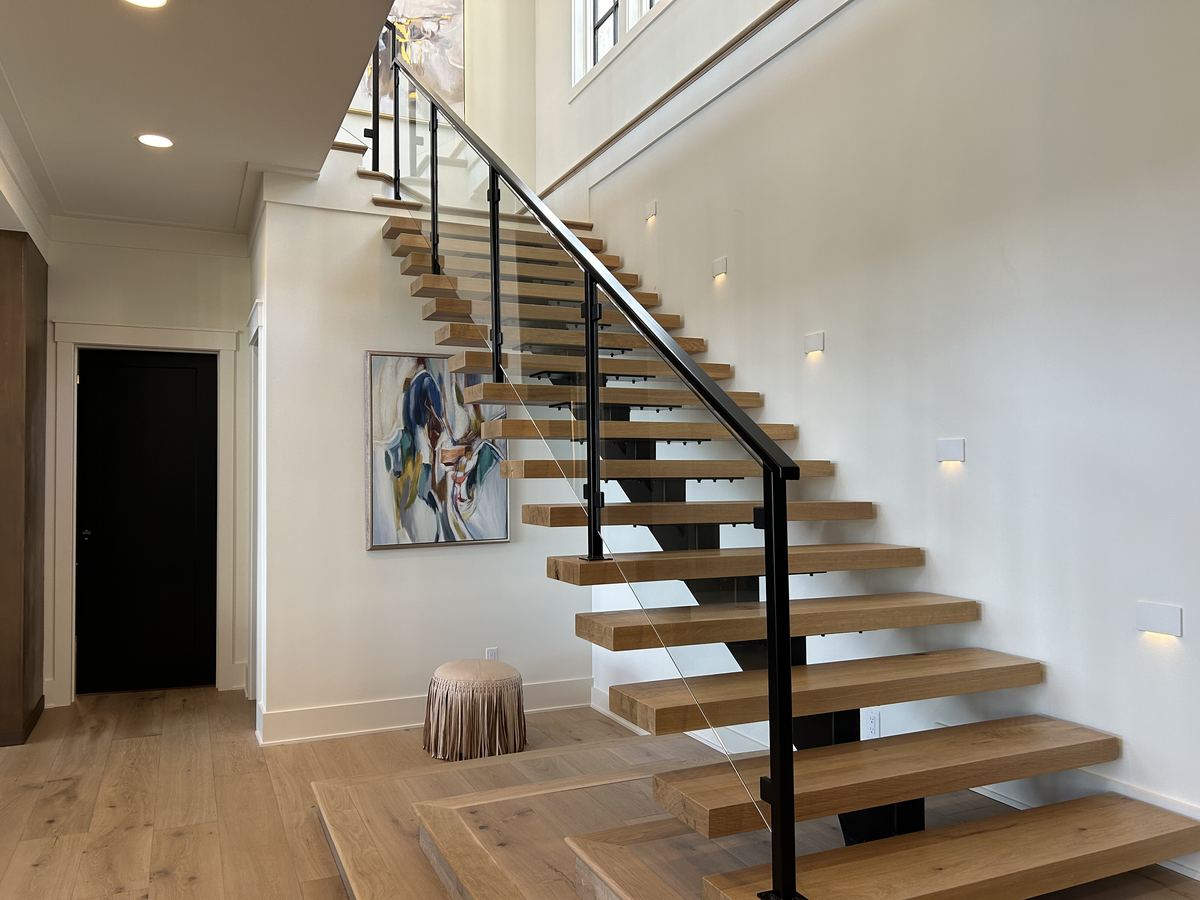 Frameless glass stair railing, interior