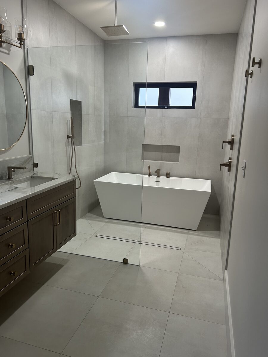 Frameless glass shower installed by Clinton Glass