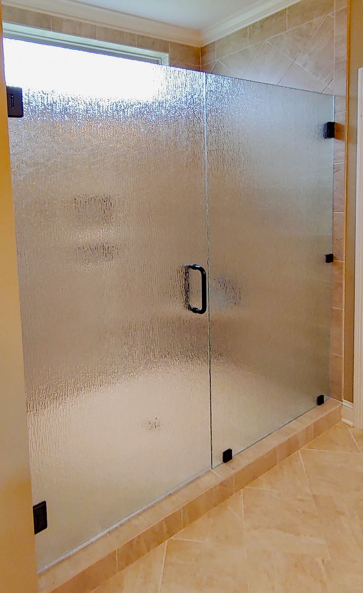 Frameless glass shower installed by Clinton Glass