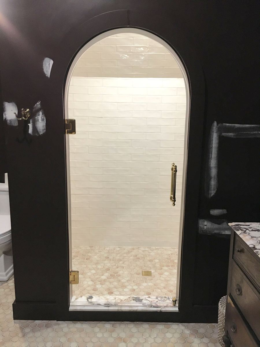 Frameless glass shower installed by Clinton Glass
