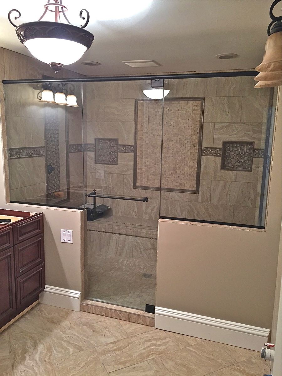 Frameless glass shower installed by Clinton Glass