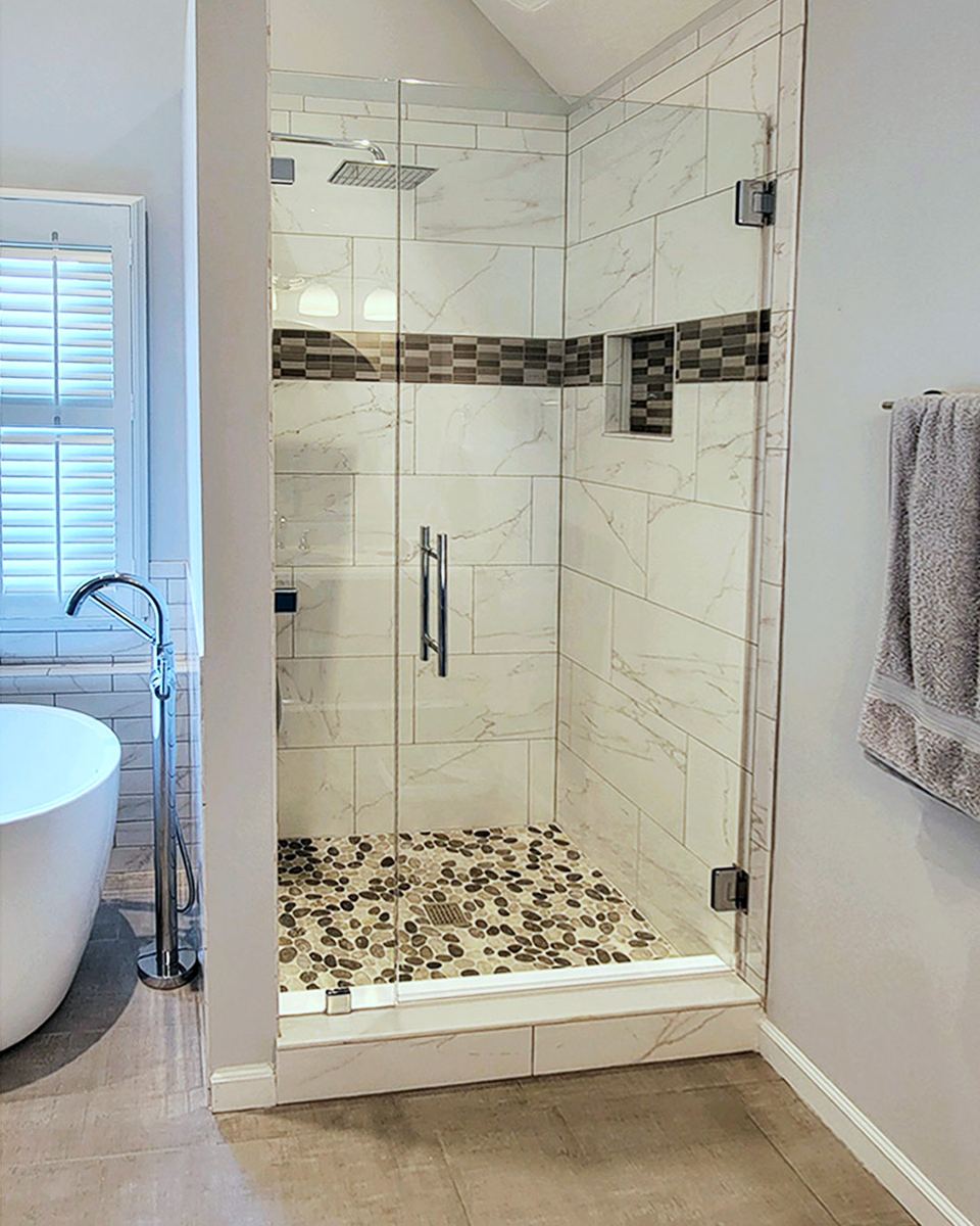 Frameless glass shower installed by Clinton Glass