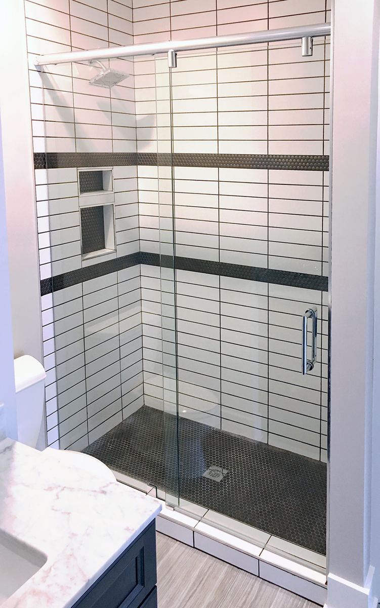 Frameless glass shower installed by Clinton Glass