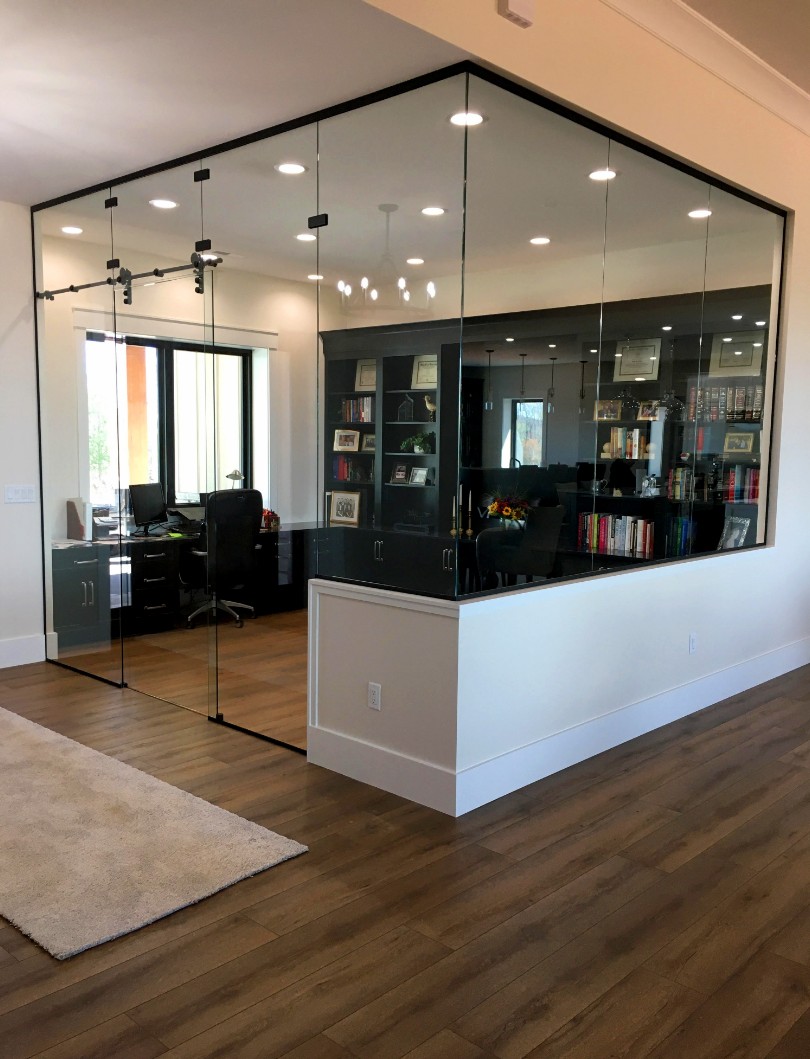 Frameless glass corner office enclosure