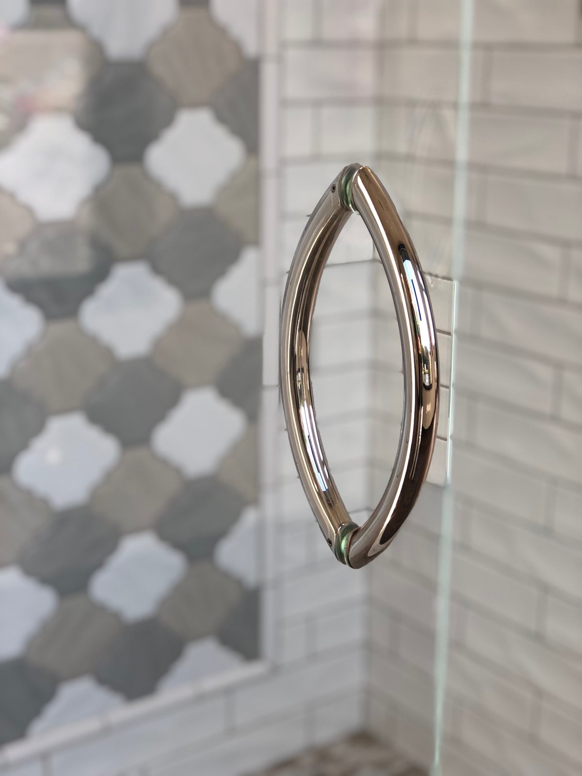 Crescent shower door hardware installed by Clinton Glass