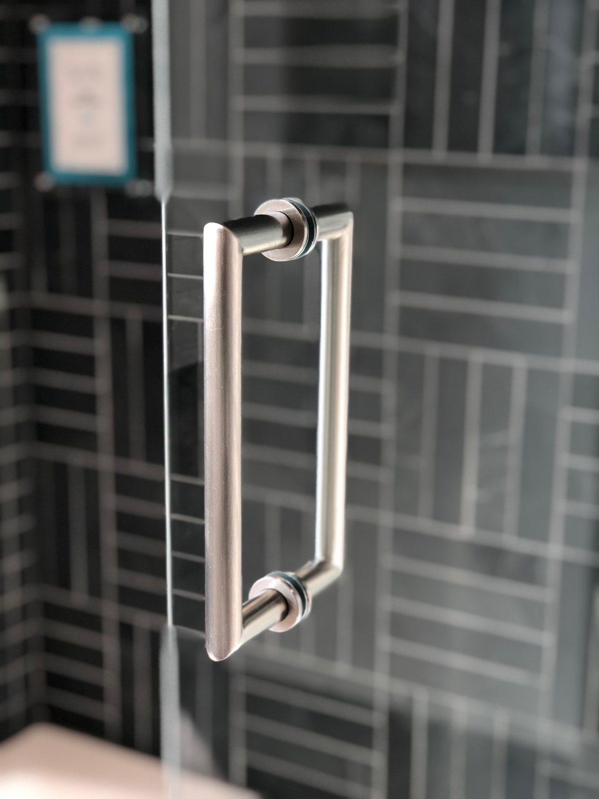 Round Square shower door hardware installed by Clinton Glass