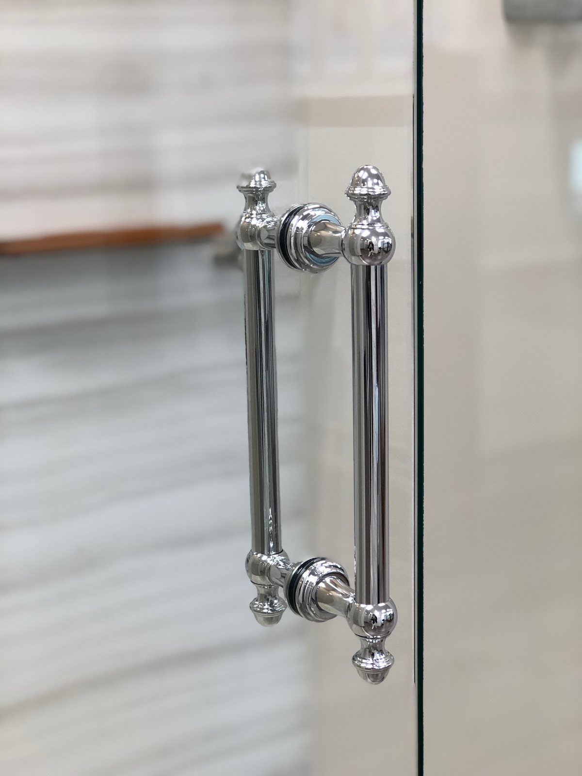 Symphony shower door hardware installed by Clinton Glass