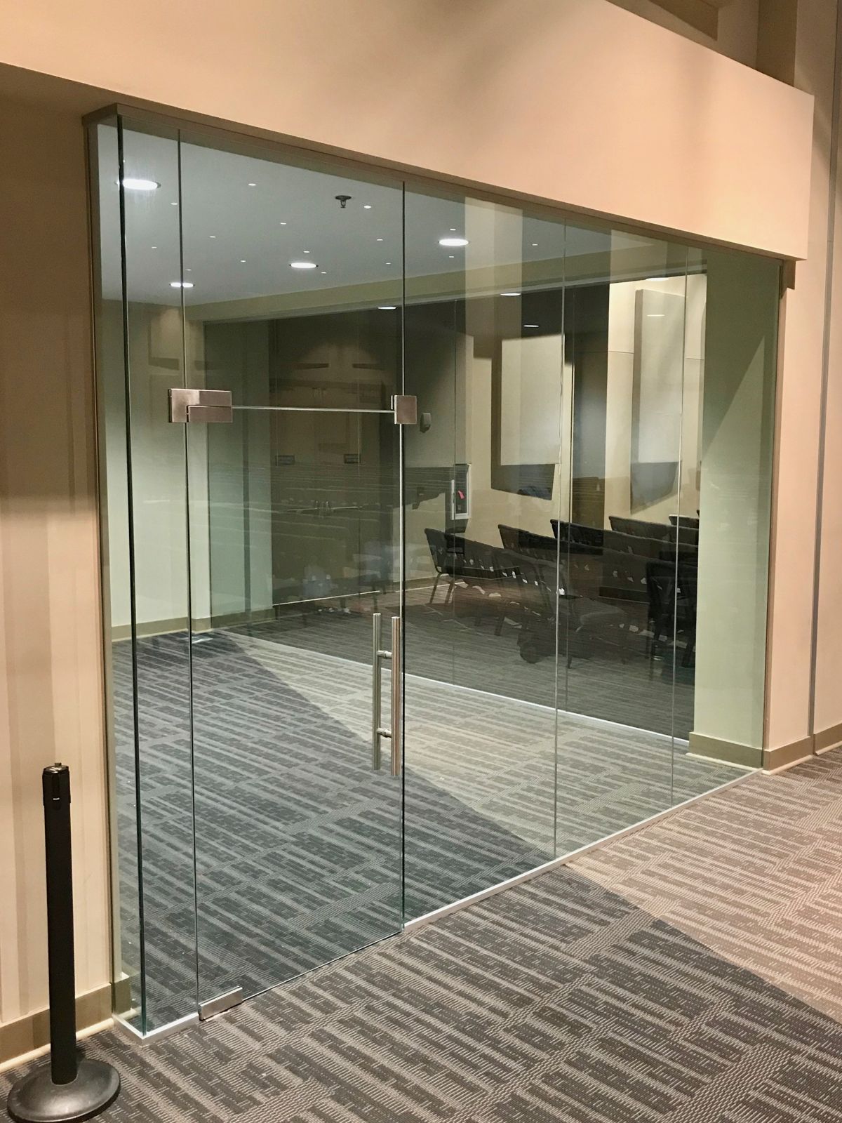 Frameless glass office doors