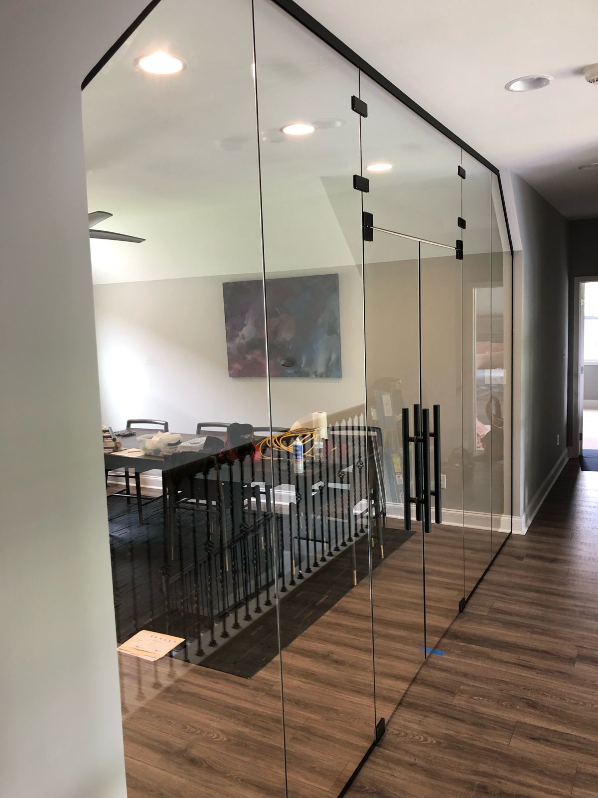 Glass office enclosure with glass door