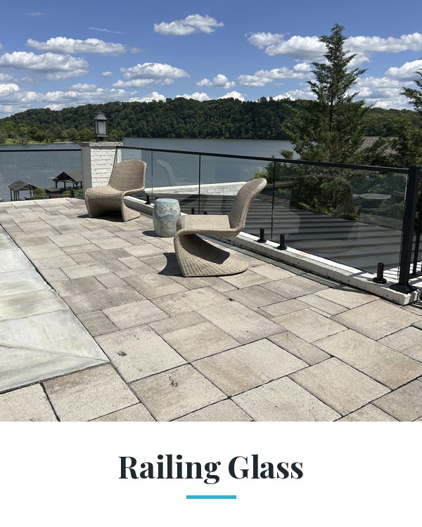Glass railing on a lakeside deck